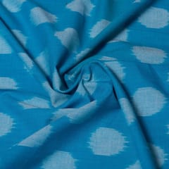 White base with sky blue dot cotton ikat fabric
