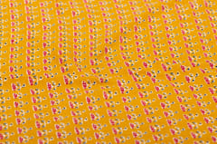 Yellow Color Base Cotton Printed Fabric With Red Flowers