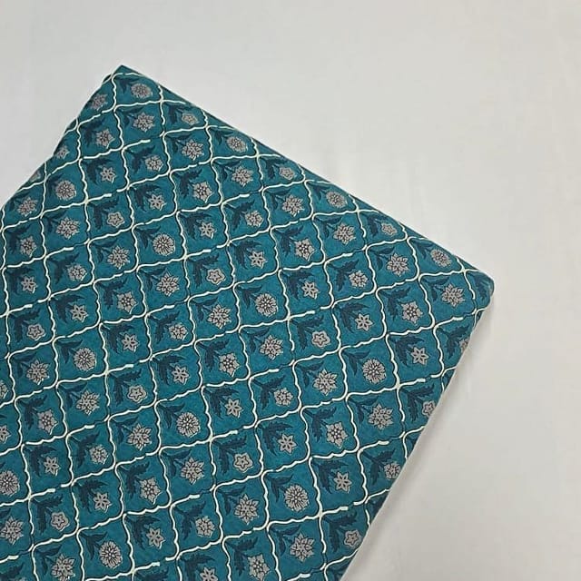 Peacock Blue Colour Cotton Cambric Printed Fabric