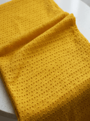 Mustard six hole Pattern Schiffli Embroidered Fabric