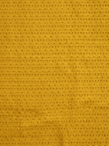 Mustard six hole Pattern Schiffli Embroidered Fabric