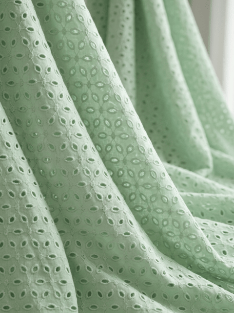 Mint Green six hole Pattern Schiffli Embroidered Fabric
